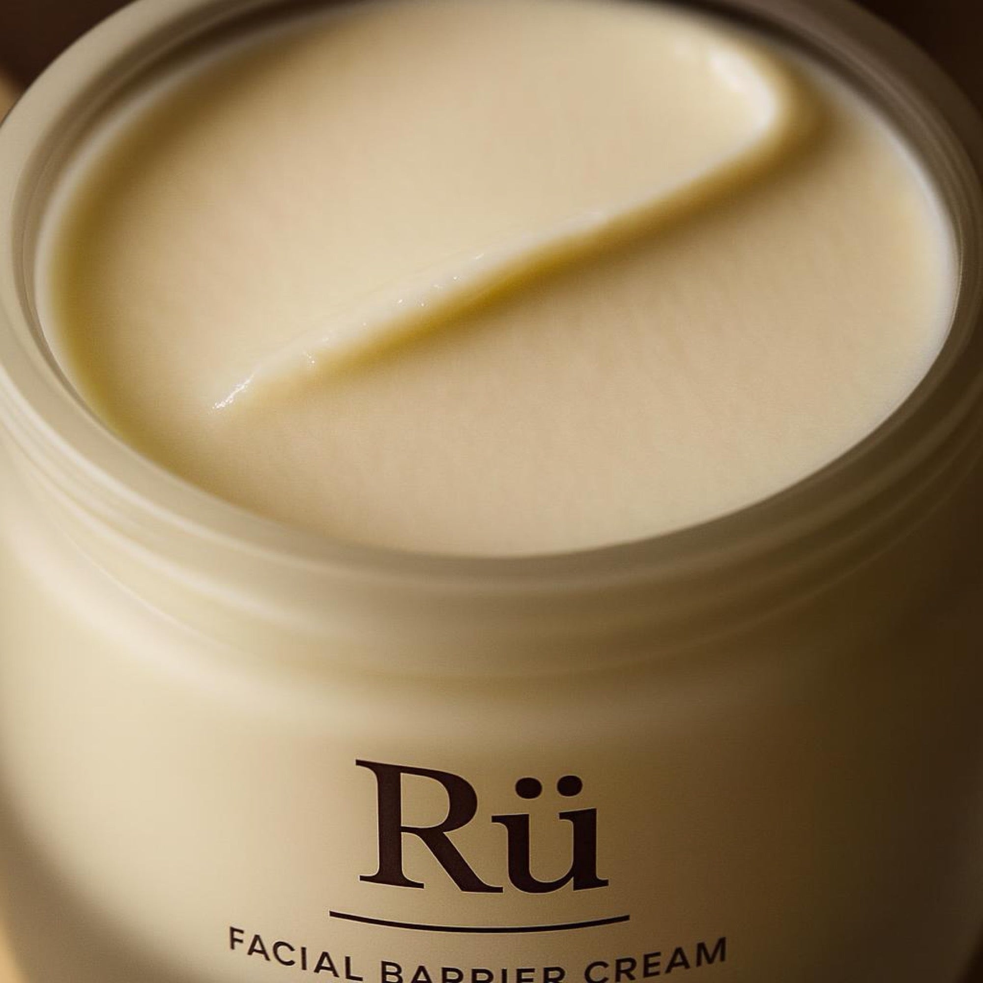 Macro of the gel-cream texture swiped across stone